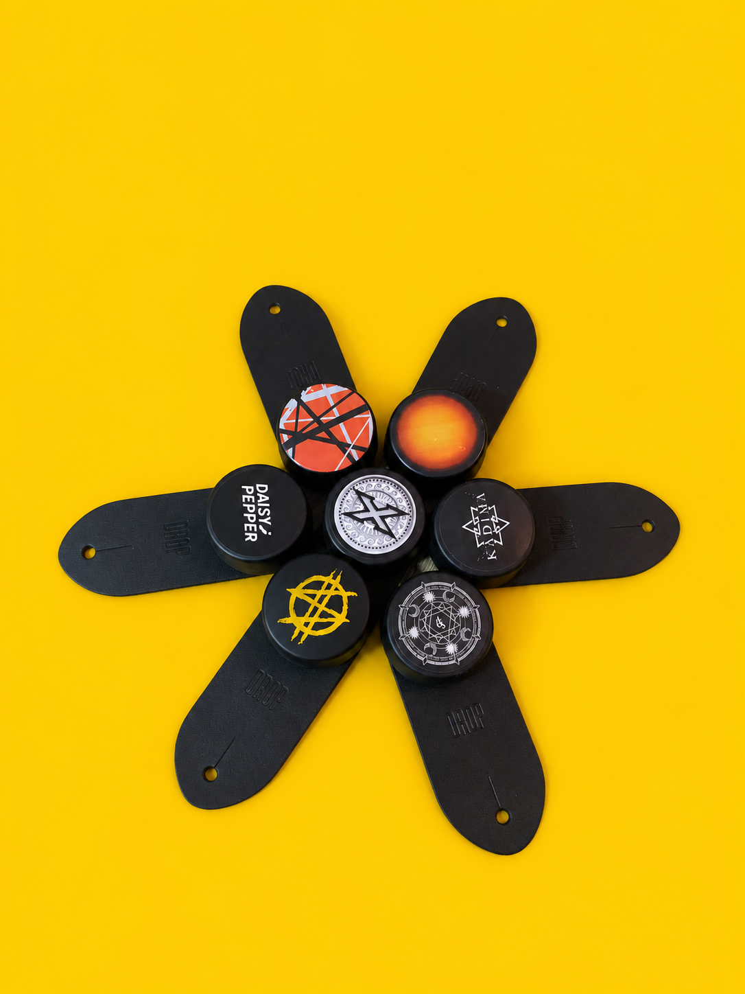 DROP custom caps on a yellow background