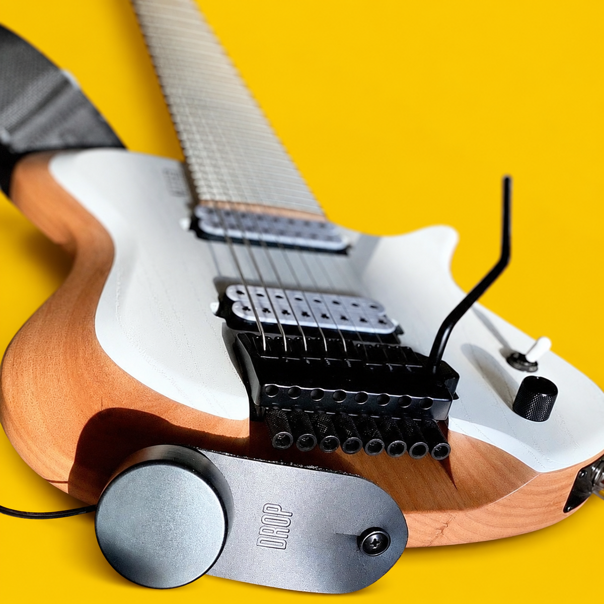 DROP custom guitar on a yellow background