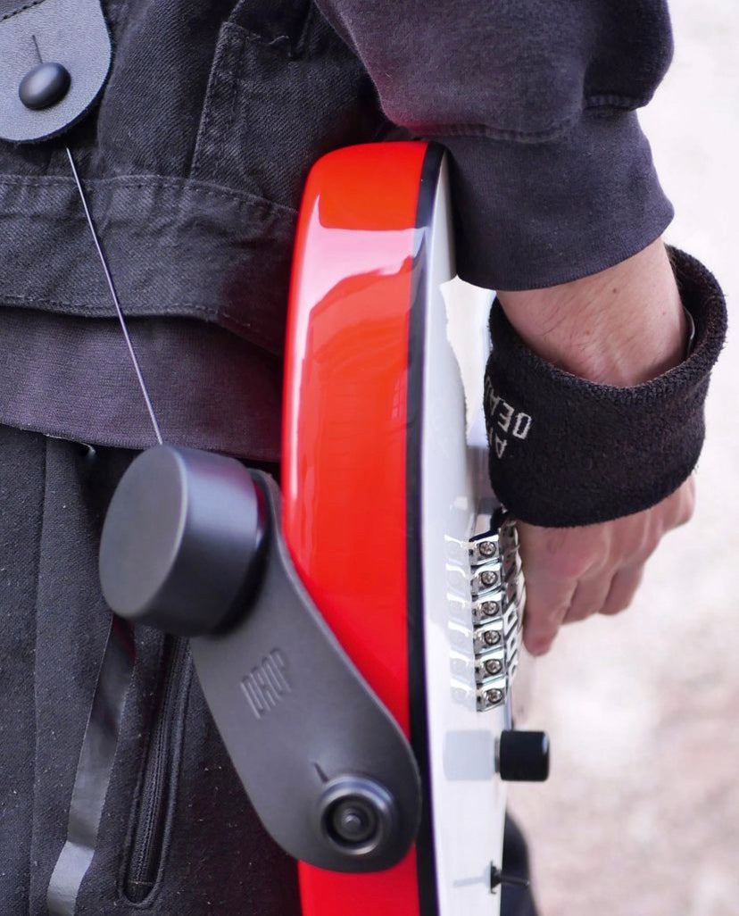 Guitar strap adjuster (Patented)